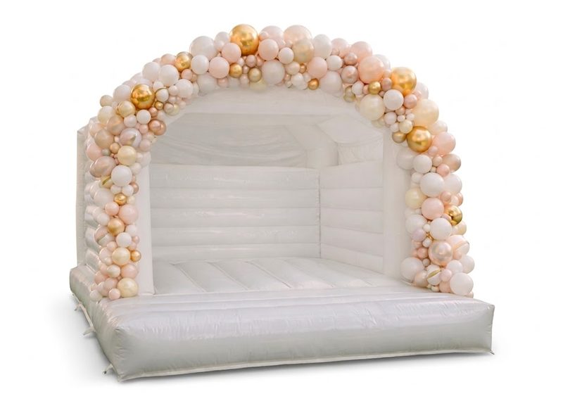Ivory Signature Wedding Castle — elegant all-white bouncy castle for weddings