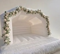 Wedding castle decorated with a floral arch outdoors